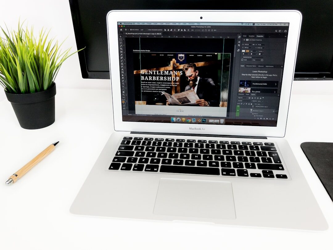 Laptop displaying a live video feed dashboard on a desk