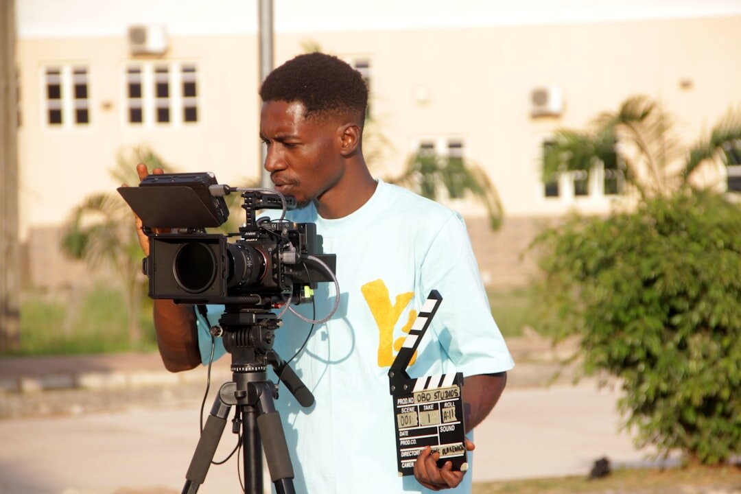 Camera operator filming a live broadcast in a television studio