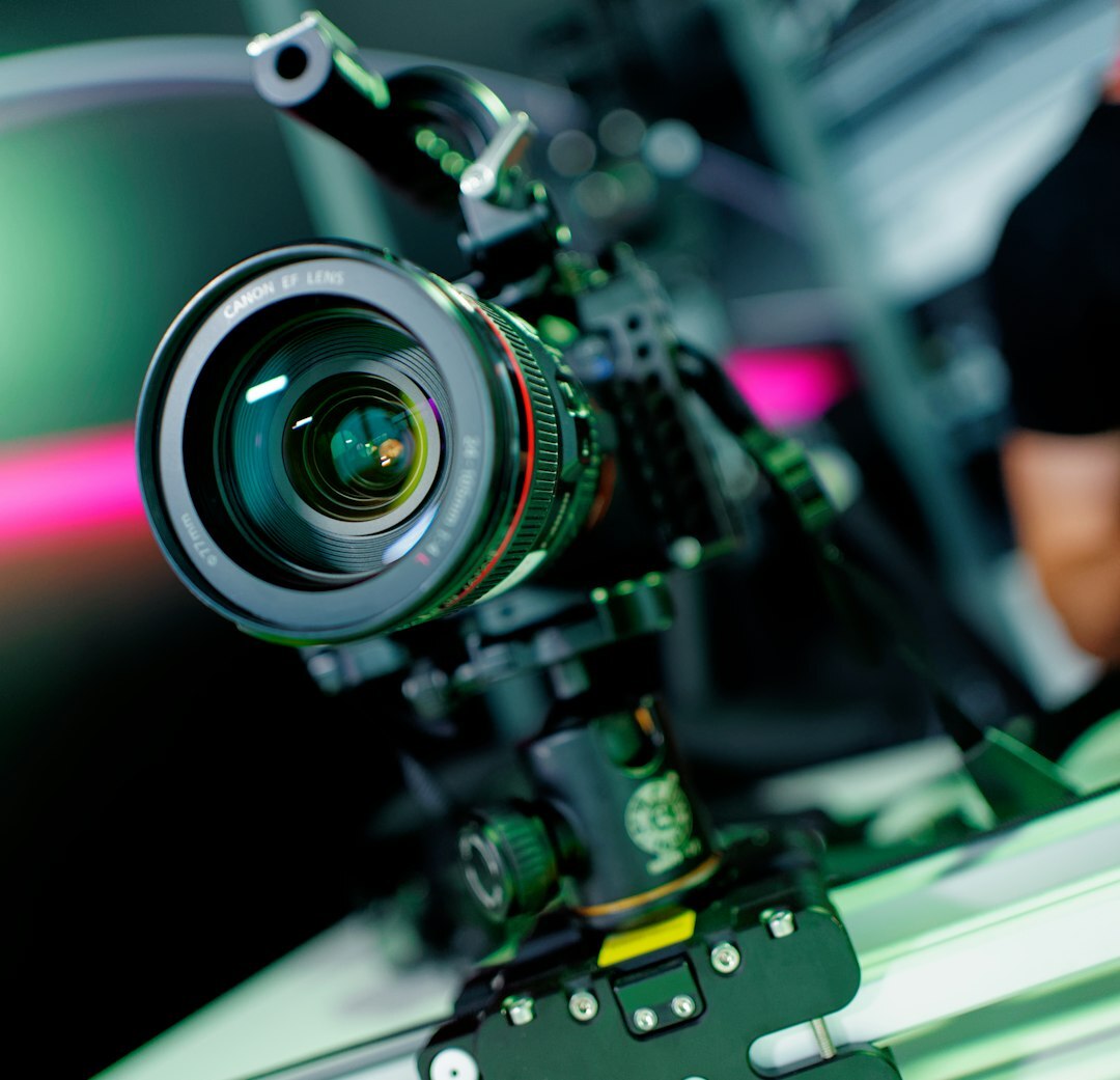 Portrait of a field camera operator with a shoulder rig camera
