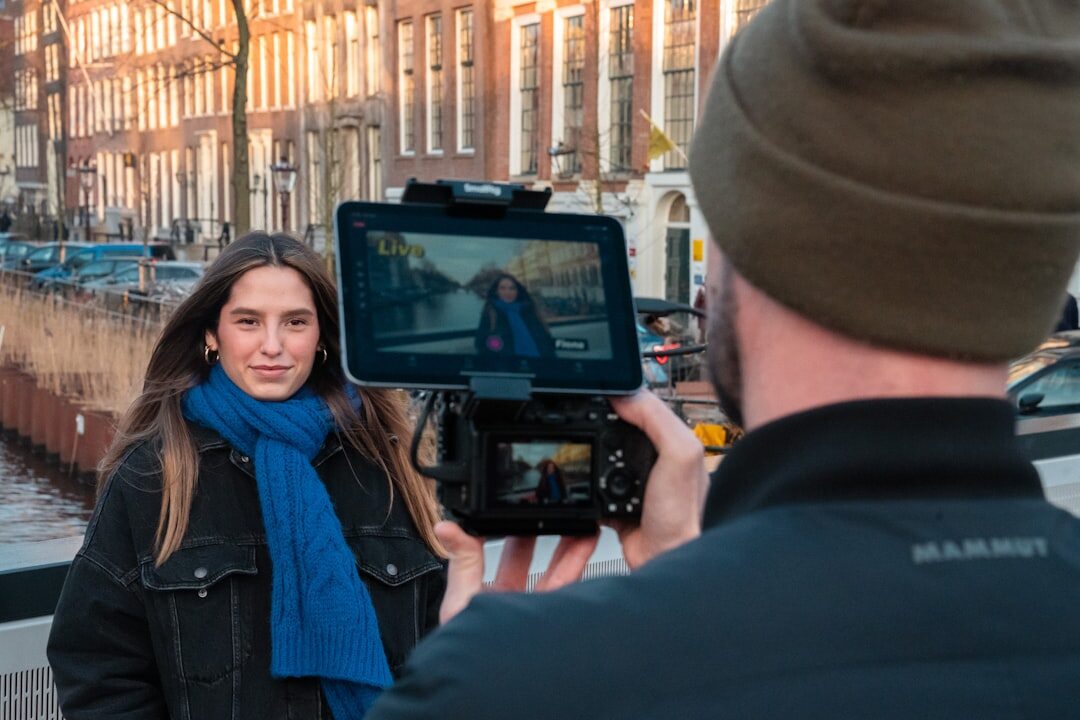 Field reporter and camera operator recording an outdoor segment