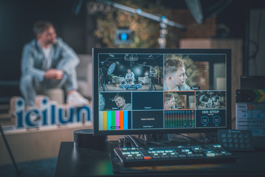 Behind the scenes view of a video production control room with monitors